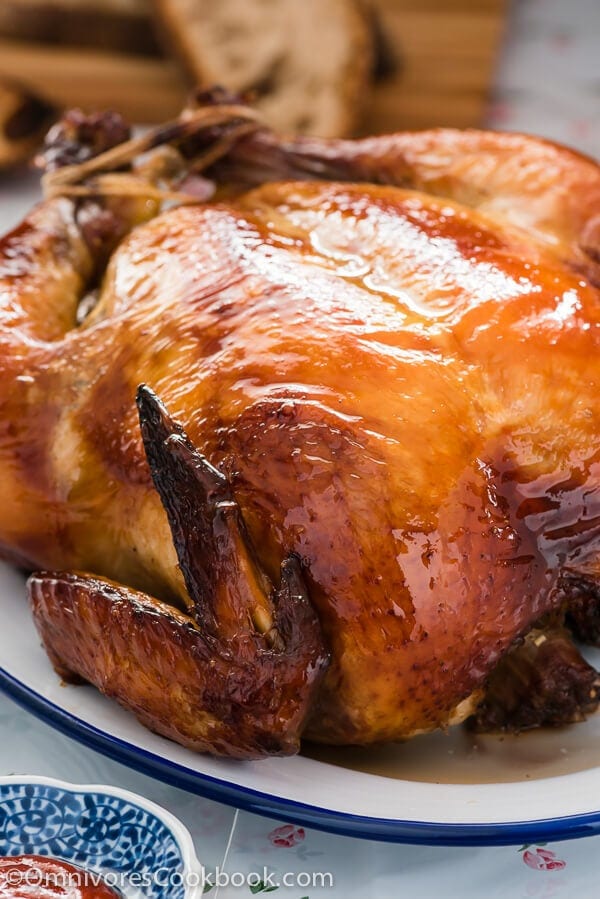 This Cantonese roast chicken tastes even better than one at a good restaurant. The skin is truly crispy and the meat so moist and tender. Want to to cook a perfect Asian style chicken in the oven? Look no further!| omnivorescookbook.com