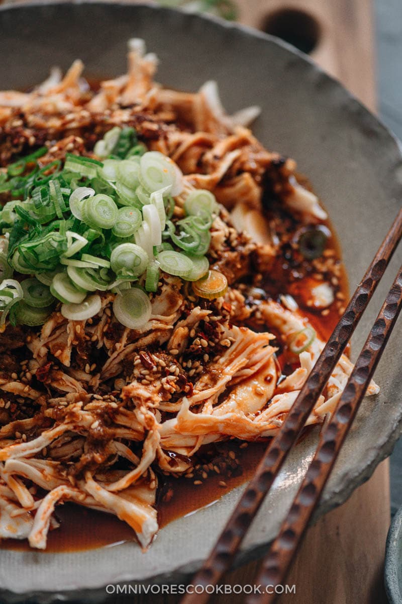 Sichuan-style shredded chicken in red oil close-up