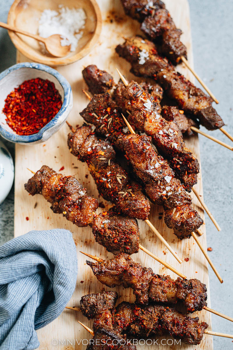 Air fryer lamb skewers served on a cutting board