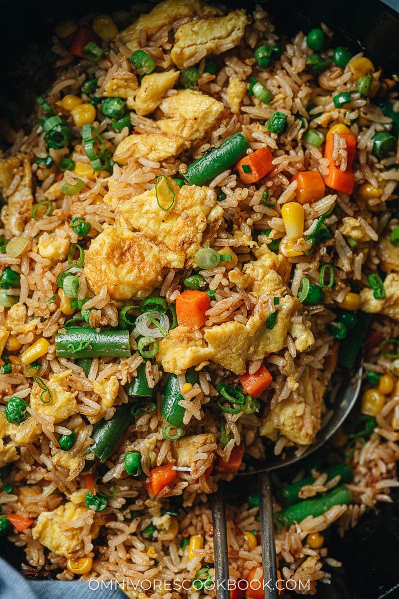 Homemade vegetable fried rice in a pan close up